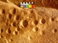 Figure 7. Small circular cupules with conical depth on southern wall.